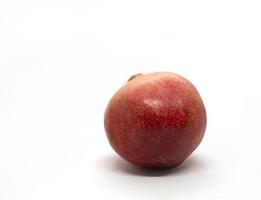 granaatappel Aan een wit achtergrond detailopname. foto