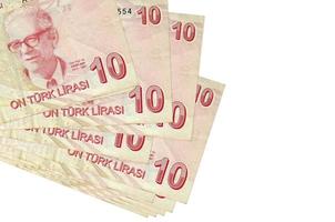 10 Turks lira's rekeningen leugens in klein bundel of pak geïsoleerd Aan wit. mockup met kopiëren ruimte. bedrijf en valuta uitwisseling foto