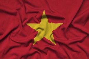 Vietnam vlag is afgebeeld Aan een sport- kleding kleding stof met veel vouwen. sport team banier foto