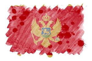 Montenegro vlag is afgebeeld in vloeistof waterverf stijl geïsoleerd Aan wit achtergrond foto