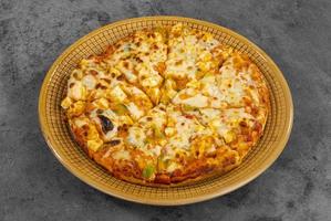 Indiase stijl van Italiaanse gerecht paneer pizza foto