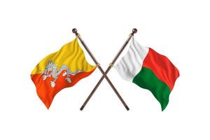 Bhutan versus Madagascar twee land vlaggen foto
