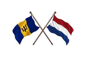 Barbados versus Nederland twee land vlaggen foto