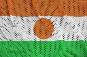 Niger vlag gedrukt Aan een polyester nylon- sportkleding maas kleding stof w foto