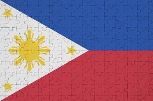 Filippijnen vlag is afgebeeld Aan een gevouwen puzzel foto