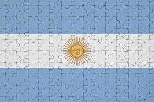 Argentinië vlag is afgebeeld Aan een gevouwen puzzel foto