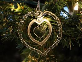 Doorzichtig glas hart Kerstmis boom ornament foto