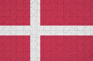 Denemarken vlag is afgebeeld Aan een gevouwen puzzel foto