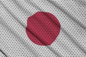 Japan vlag gedrukt Aan een polyester nylon- sportkleding maas kleding stof w foto