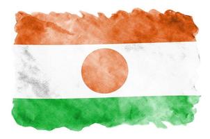 Niger vlag is afgebeeld in vloeistof waterverf stijl geïsoleerd Aan wit achtergrond foto