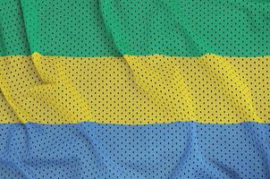 Gabon vlag gedrukt Aan een polyester nylon- sportkleding maas kleding stof w foto