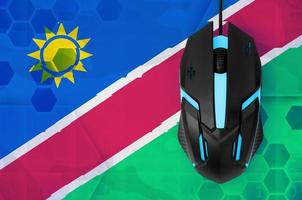 Namibië vlag en computer muis. concept van land vertegenwoordigen e-sport team foto