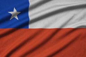 Chili vlag is afgebeeld Aan een sport- kleding kleding stof met veel vouwen. sport team banier foto