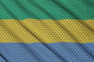 Gabon vlag gedrukt Aan een polyester nylon- sportkleding maas kleding stof w foto