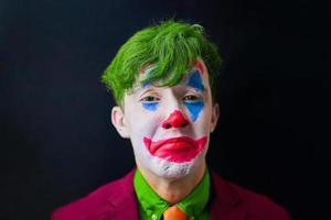 man in clown make-up foto