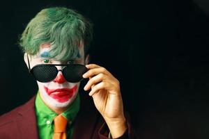 man in clown make-up foto