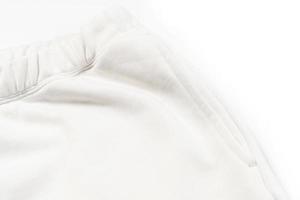 katoen kleding stof structuur van een wit joggingbroek foto