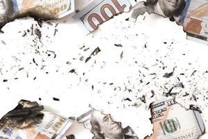 overblijfselen van een verbrand uit dollar rekeningen verminderd naar as na een brand. foto