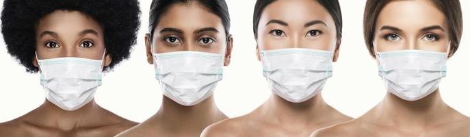 verschillend etniciteit Dames vervelend gezicht masker voor bescherming van nieuw coronavirus ziekte foto