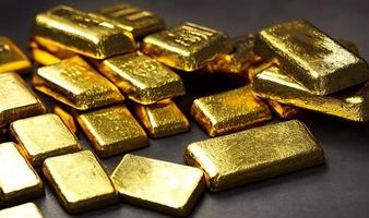 goud ingots. stack van goud bars, financieel concepten. foto