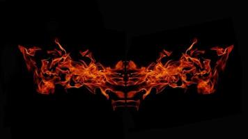 een prachtige vlam in de vorm van een voorstelling. zoals uit de hel, met een gevaarlijke en vurige vurigheid, zwarte achtergrond foto