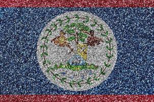 Belize vlag afgebeeld Aan veel klein glimmend pailletten. kleurrijk festival achtergrond voor partij foto