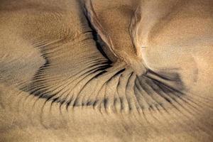 patronen in de strand zand foto