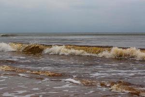 Baltisch zee kust Bij zonsondergang foto