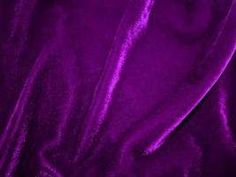 Purper fluweel kleding stof structuur gebruikt net zo achtergrond. leeg Purper kleding stof achtergrond van zacht en glad textiel materiaal. Daar is ruimte voor tekst. foto