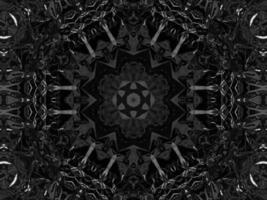 zwart zilver metaalachtig caleidoscoop achtergrond. abstract en symmetrisch patroon met donker gevoel. foto