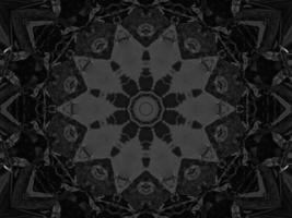 zwart zilver metaalachtig caleidoscoop achtergrond. abstract en symmetrisch patroon met donker gevoel. foto