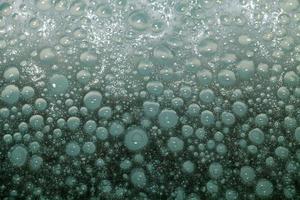 detailopname van bubbels in water foto
