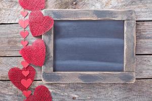 valentijnsdag dag decoraties in de omgeving van een schoolbord foto