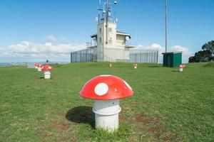 'champignons' Aan top van takarunga of monteren Victoria in devonpoort, welke zijn in feit ventilatieopeningen voor een water pompen station, noorden eiland, nieuw Zeeland. foto