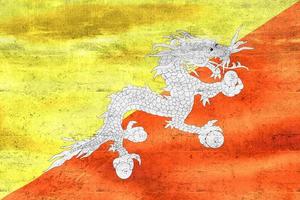 vlag van bhutan - realistische wapperende stoffen vlag foto