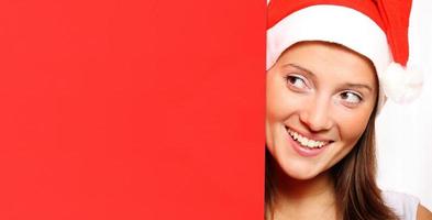 santa's helper met rood bord foto