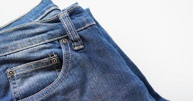 detailopname van een denim jeans munt zak- met kopiëren ruimte foto