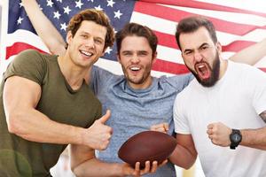 gelukkig Amerikaans Amerikaans voetbal fans foto