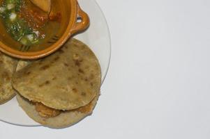 Mexicaans gordita's de migaja's met varkensvlees korsten en Chili foto