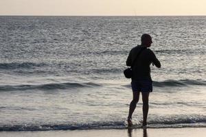 strand kust vissen, traditioneel visvangst net zo een hobby foto