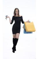 boodschappen doen concept. mooi glimlachen brunette met boodschappen doen Tassen foto