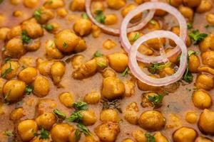 Punjabi chana masala of chole massaal, is een authentiek noorden Indisch stijl kerrie gemaakt met kikkererwten foto