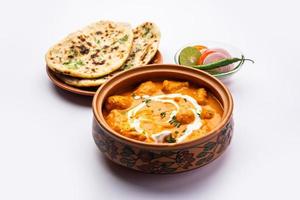 smakelijk boter kip kerrie of murg makhanwala of masala schotel van Indisch keuken foto