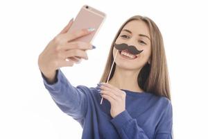 schoonheid grappig tiener- meisje maken selfie met haar mobiele telefoon foto