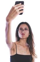 Aziatisch vrouw maken selfie met haar cel telefoon foto