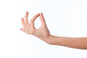 vrouw hand- uitgerekt naar boven met gebalde vingers geïsoleerd Aan wit achtergrond foto