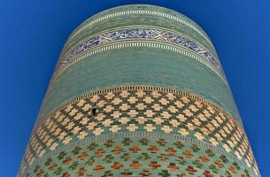 Kalta minor minaret en de historisch architectuur van jeuk kala, omringt door een muur binnenste stad- van de stad van kiva, Oezbekistan een UNESCO wereld erfgoed plaats. foto