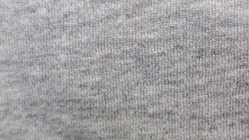 de grijs katoen kleding stof structuur net zo achtergrond foto