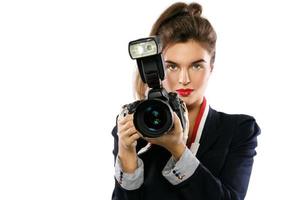 vrouw fotograaf met een dslr camera Aan wit achtergrond foto