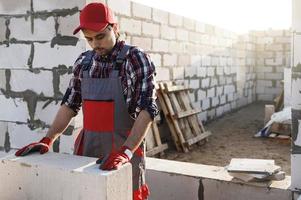 metselaar is werken Bij de bouw plaats foto